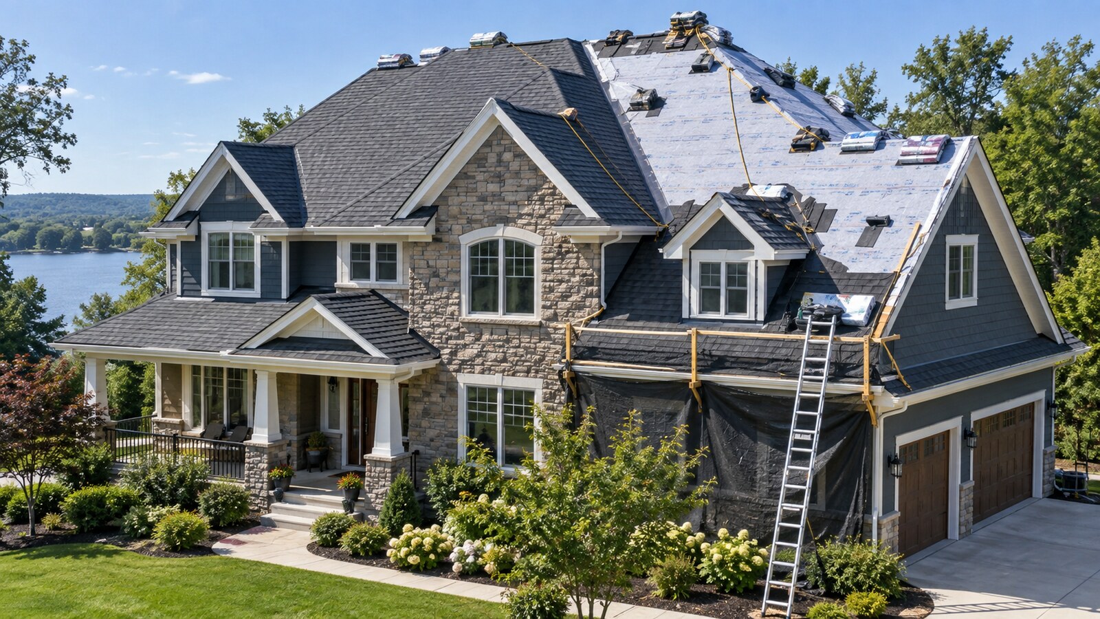 Large two-story house with asphalt shingle roof replacement in progress